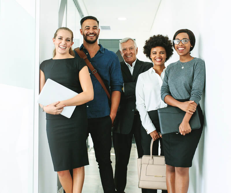 Employees smiling in an office